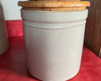 Crock with a wooden lid, does not fit tightly 8"H