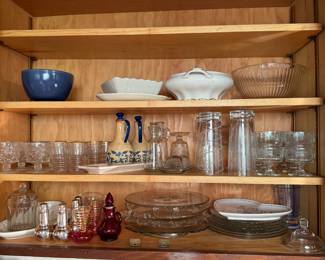 Cabinet lot with vintage drinkware, cake plates, cruets, bowls, salt & pepper shakers