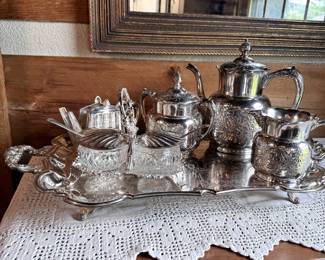 Silver-plated tea service with Pairpoint tea, sugar & creamer, teapot napkin holder, jam dishes & 26"L footed tray