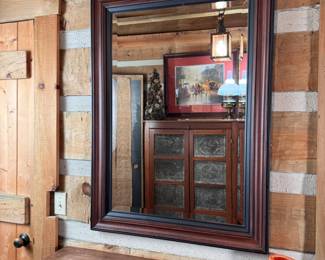 Beveled mirror with cherry and black plastic frame 43" x 30"