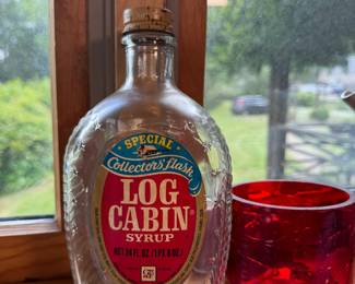 Log Cabin syrup bottle with Liberty on back