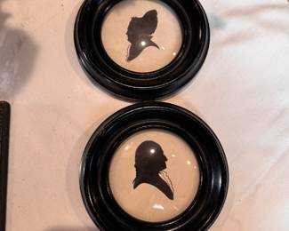 Pair Of Framed "George & Martha Washington" Silhouettes in domed glass and round wood frames, backs have been taped to frame, 5"W