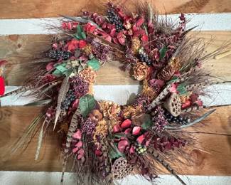 Dry floral wreath with berries and feathers 28"W
