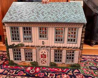 Tin litho doll house with some furniture, overall good condition, minor wear seen inside, 21"H x 21"W