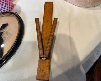 Hand-made wooden ruler and Lufkin ruler