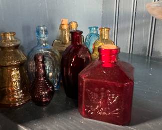 Collection of small jewel color pressed glass bottles 1.5-2"