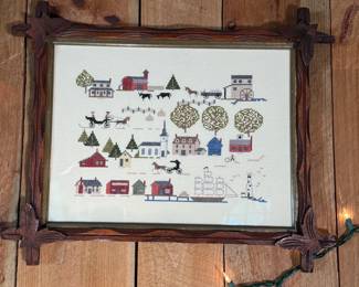 Cross stitch village in Adirondack frame 18" x 21"