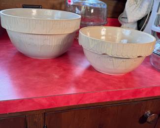 USA tan pottery bowls, the largest has a long intact hairline, largest bowl is 12"W