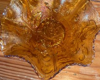 Marigold carnival glass ruffled bowl with floral pattern 8"