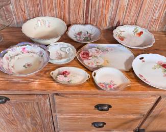 Group of porcelain floral dishes and bowls, longest is 12"