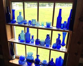 Large lot of vintage blue glassware and bottles