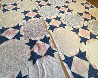 Vintage lightweight American stars quilt with blue and pink, minor wear to one edge, minor stain 82" x 72"