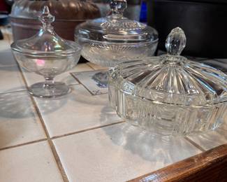 Trio of covered candy dishes including an Anchor Hocking Old Cafe 6"W
