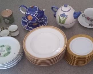 Limoges fine bone china gold gilded.  One chip on one bowl. We also have serving trays.