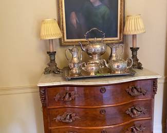 Pretty chest and silver tea service