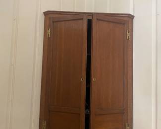 Pretty corner cabinet