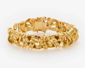 10. 18k Tiffany Co. Thick Cross Over Bracelet