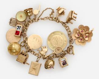 44. 14k Charm Bracelet w/ 14k charms, Several Articulating "Good Luck" theme, 36.9 dwt