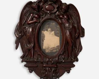 176. Walnut Frame with Carved Angels, ca. 19th c.