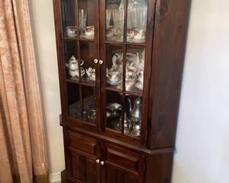 One of a pair / corner china  hutch cabinets. 
