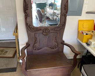 Antique hall tree, wide seat. Has veneer cupping.  Item is presale priced at $175,  contact to purchase. 
