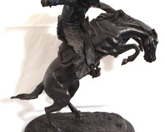 88 - Remington "Wooly Chaps" Bronze Statue, 22" 22 x 16 x 8
