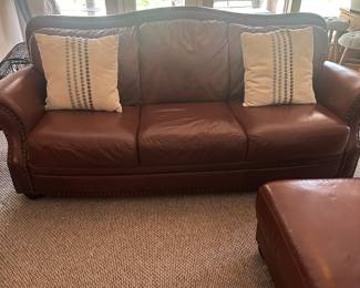 Leather four piece set couch, loveseat, armchair and ottoman
