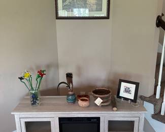 Entertainment center w/heater 
Native signed weaved bowls
Blown glass flowers