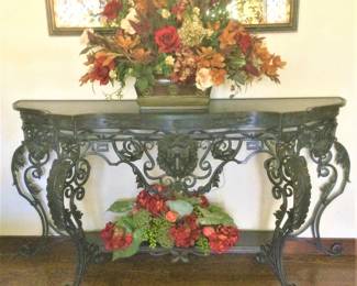 A Wrought Iron and Marble Lion's Head Console Table