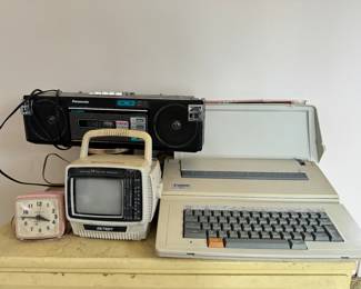 Electronics – alarm clock, portable TV, typewriter and boombox
