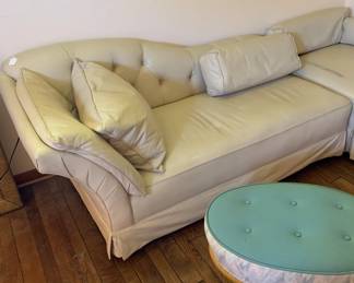 White Leather Chaise Lounge and mid-century Haywood Wakefield tool