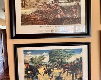 Framed military history artwork.