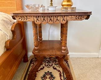 Antique oak carved oak side table.