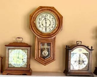 Beautiful collection of working antique clocks.