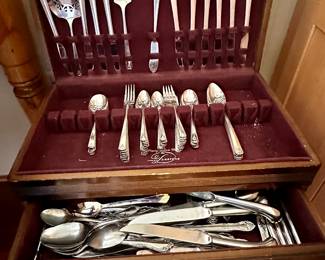 Two sets of  flatware.