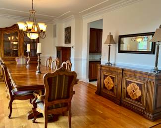 Dining room Banquet Table includes 10 chairs and matching China Cabinet 
Ethan Allen 
