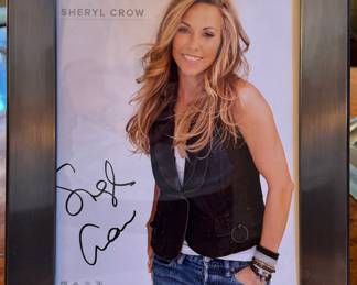 Framed Autographed Picture of Sheryl Crow. 