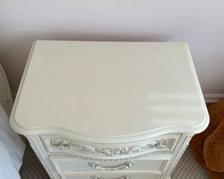 Off-White Three Drawer Bedside Table. Measures 24" W x 17" D x 36" H. Photo 2 of 3. 