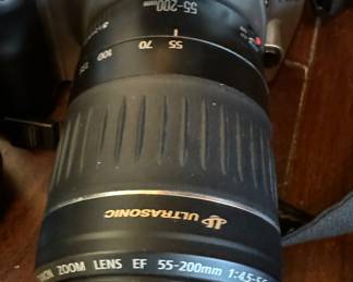 Canon EOS with Two Lenses Including A 55-200 MM Lens. Photo 2 of 2.