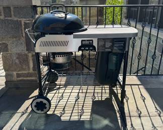 Weber Slate-Blue Kettle Performer Charcoal Grill.
