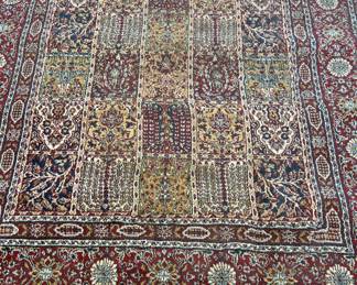Persian Style Rug. Measures 5' x 7'. 