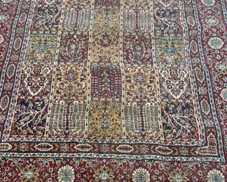 Persian Style Rug. Measures 5' x 7'.