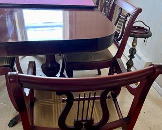 ANTIQUE MAHOGANY DINING TABLE WITH SIX LYRE BACK CHAIRS