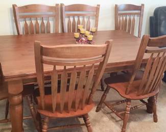 Seven piece solid wood Dining room table set.
