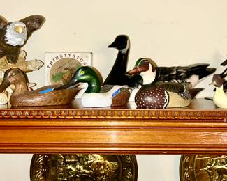 Close-up of 4 signed duck decoys