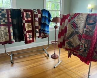 Beautiful assortment of hand-stitched, pre-1920s quilts