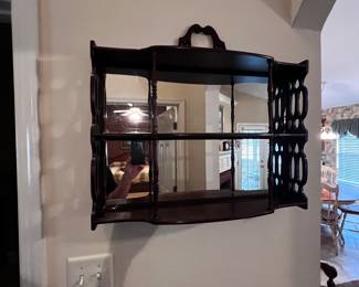 Mirrored wall shelf