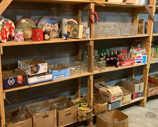 Cookie tins, Jars, Bottles and interesting old stuff are in the basement. (Sorry it's a little musty.)
