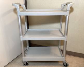 DILA103 Cambo Brand Rolling Utility Cart Open design, three shelves, on wheels, very smooth rolling, sturdy, cart. Each shelf measures 24.5 x 16 inches and height to handle measures 3ft 4 inch.
