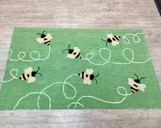 DILA101 Liora Manne, Busy Bee, Floor Covering New, fun and whimsical Flying Bee, mat by colorful and creative designer Liora Manne. Rug is hand tufted and measures approximately 49" x 31" inches. 

